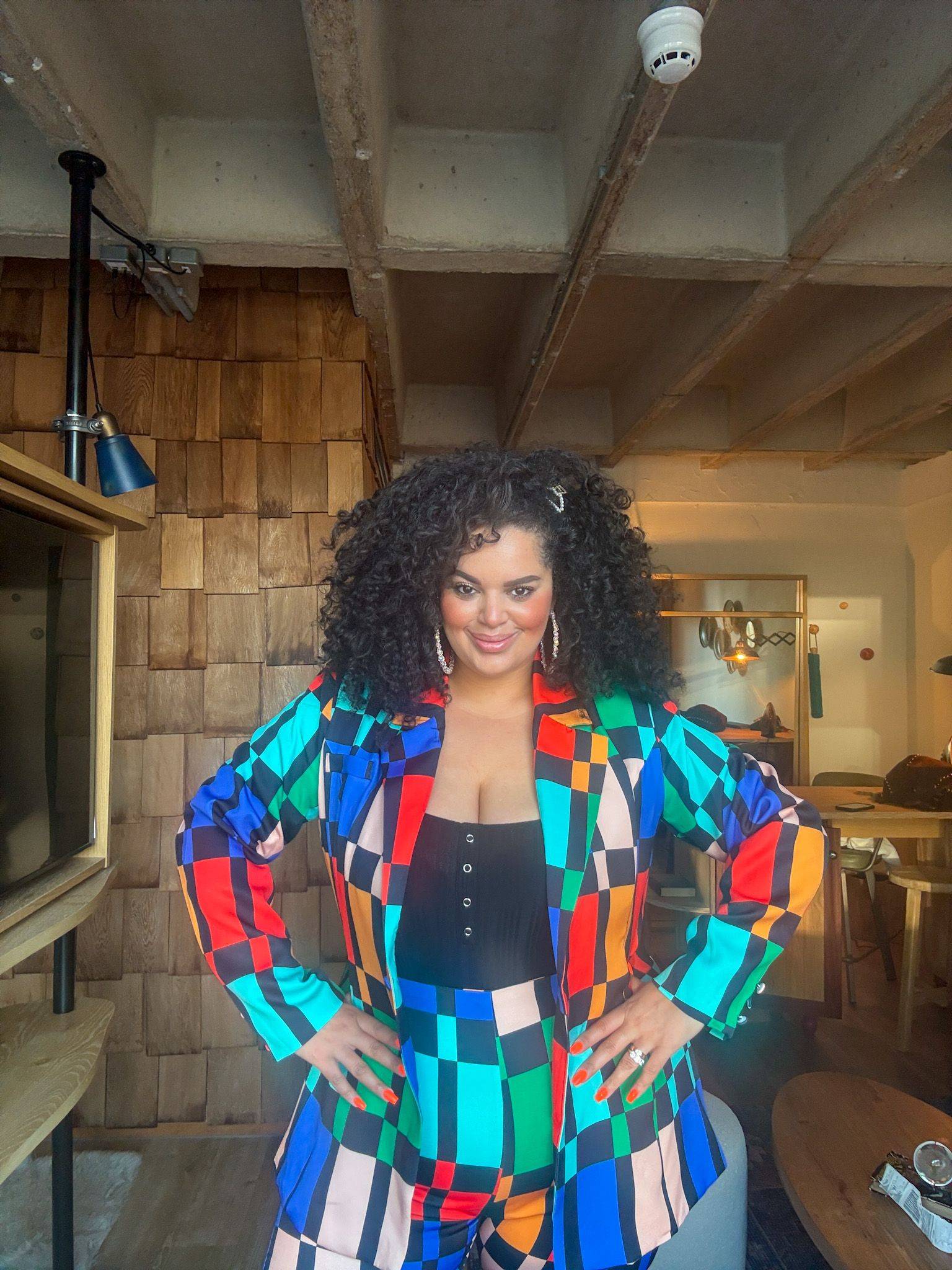 Laura Bartlett in a colourful suit in Manchester